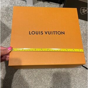 Empty magnetic Louis Vittion box.